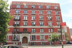 This brick, 34-unit building in Harlem, New York, is a limited-equity cooperative.