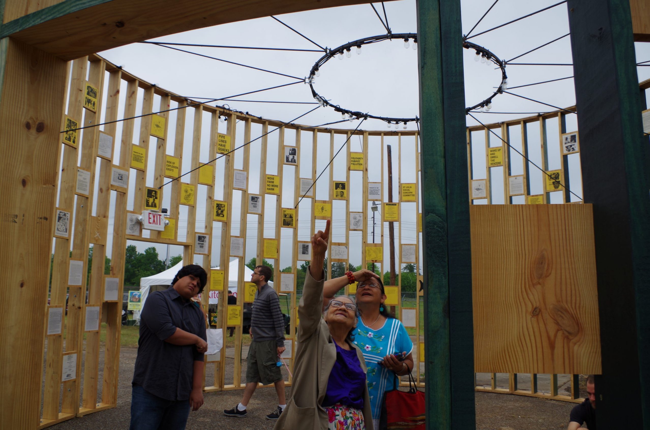 Locals view an art installation in Austin.